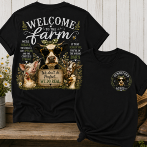 Unisex graphic T-shirt featuring a "Welcome to the Farm" design with farm animals, a rustic barn scene, and a coordinating front chest logo